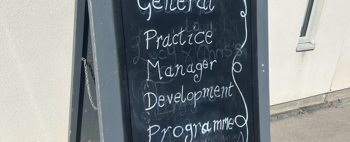 A sign with the words Practice Managers Development Programme written on it