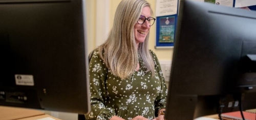 Colleague working at a computer.