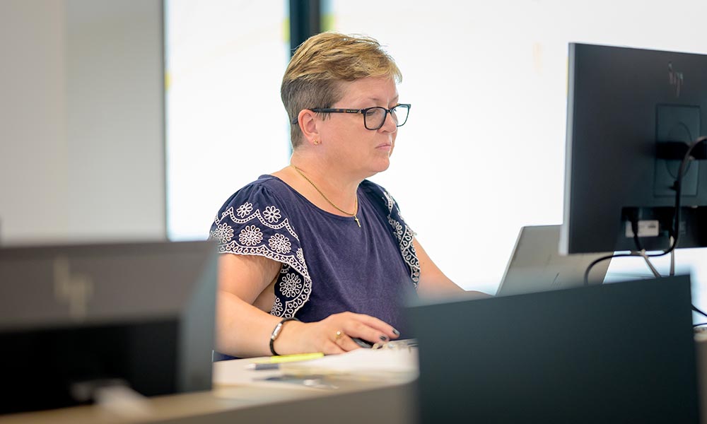 Colleague working at a computer.