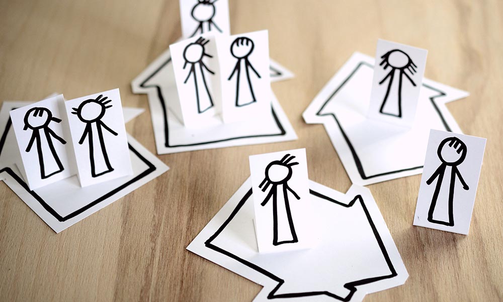 People and arrows drawn on bits of paper.